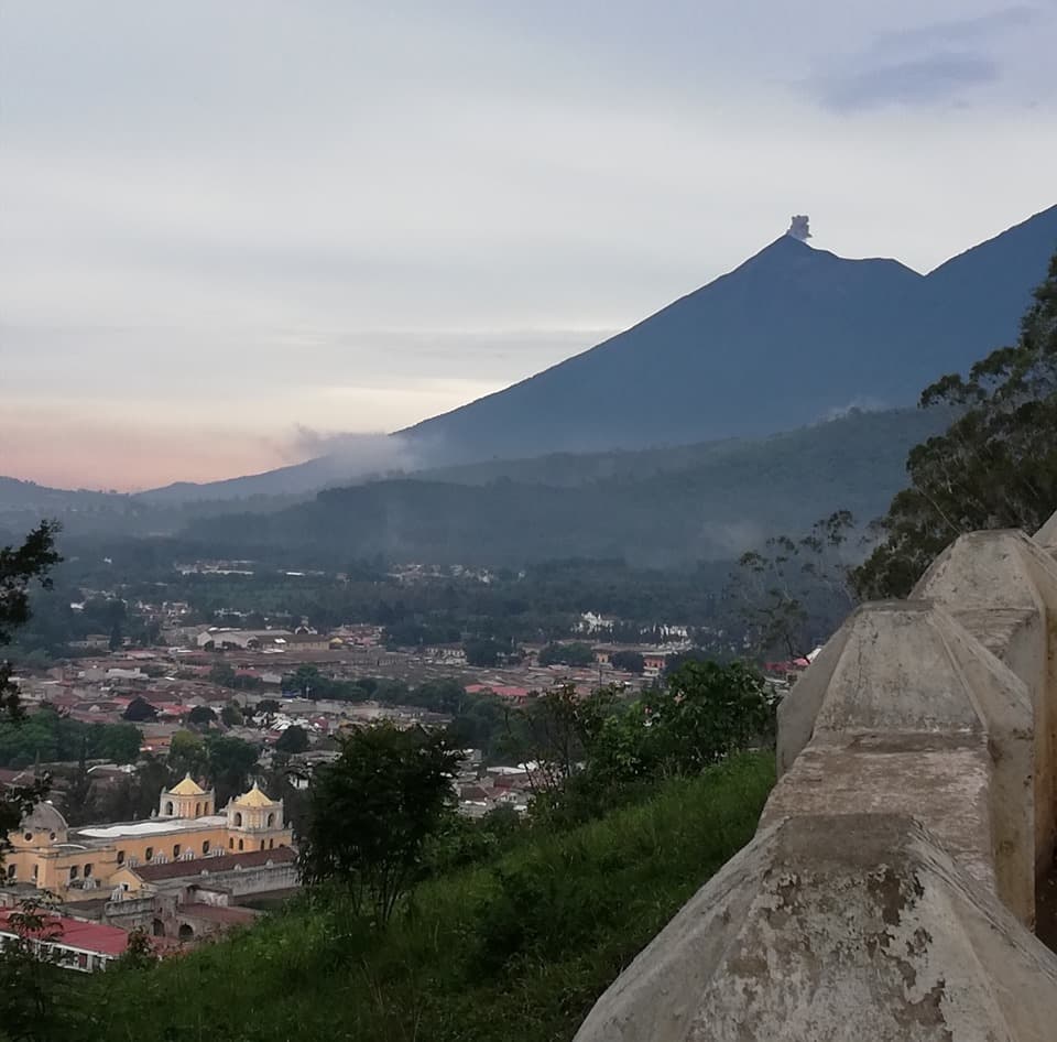 Antigua Guatemala seen from the Cerro de la Cruz, with the Agua volcano behind the city